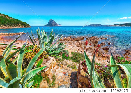 Fantastic azure water with rocks and lots of 55592475