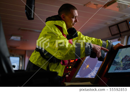 Navigator. pilot, captain as part of ship crew Navigator. pilot, captain as part of ship crew 55592853