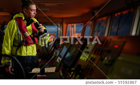 Navigator. pilot, captain as part of ship crew 55592867