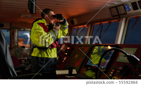 Navigator. pilot, captain as part of ship crew 55592868