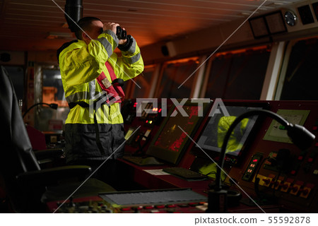 Navigator. pilot, captain as part of ship crew Navigator. pilot, captain as part of ship crew 55592878