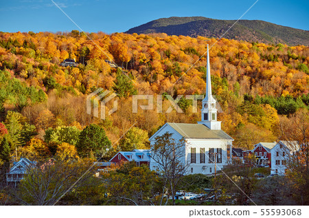 Iconic New England church in Stowe town at autumn 55593068