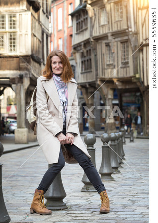 girl  in the city of Dinan 55596351