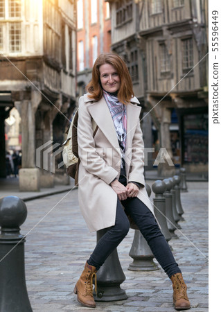 girl  in the city of Dinan 55596449