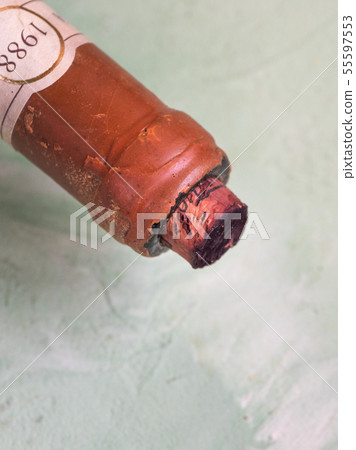Old wine, bottle neck with cork. 55597553