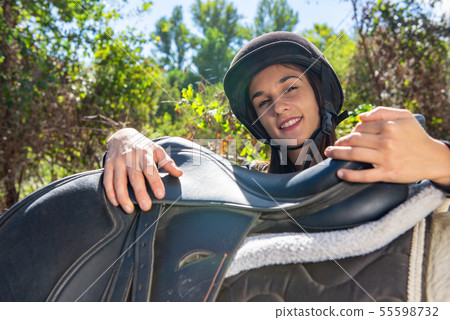 portrait of young female rider 55598732