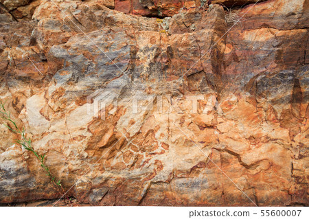 Broken rock texture with yellow and orange colors. Broken rock texture with yellow and orange colors. 55600007