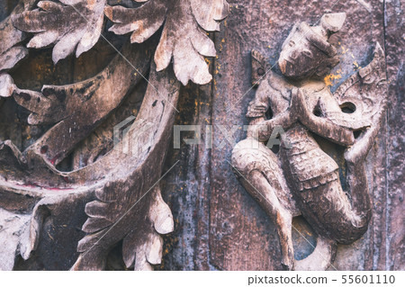 Archaeological, Close Up of carved art figures Archaeological, Close Up of carved art figures 55601110
