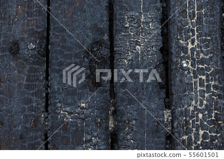 Black burnt wooden background Textured board Black burnt wooden background Textured board 55601501