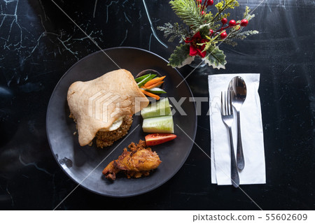 The traditional Indonesian food dish with fried The traditional Indonesian food dish with fried 55602609