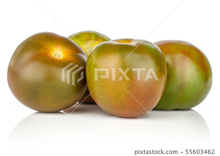 Greenish red tomato isolated on white Greenish red tomato isolated on white 55603462
