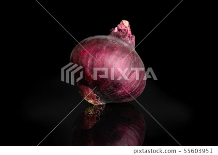 Stale red onion isolated on black glass Stale red onion isolated on black glass 55603951