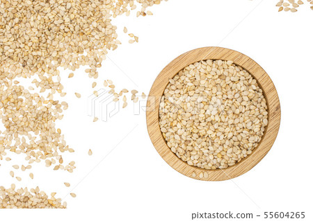 Unpeeled sesame seeds isolated on white Unpeeled sesame seeds isolated on white 55604265