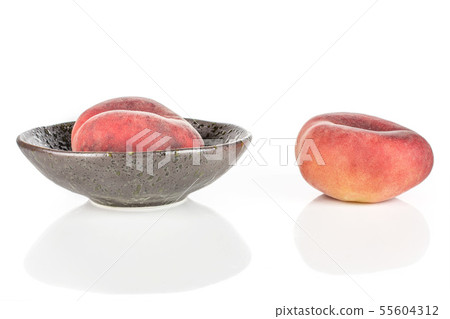 Fresh paraguay peach isolated on white Fresh paraguay peach isolated on white 55604312