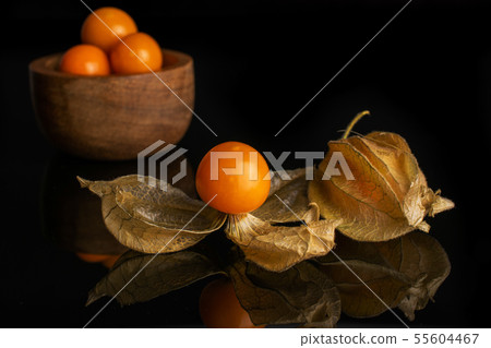 Fresh orange physalis isolated on black glass 55604467