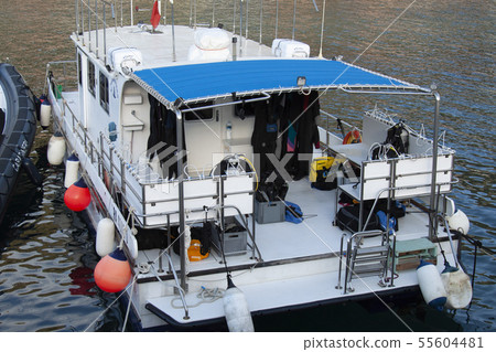 boat in the harbor with diver suits boat in the harbor with diver suits 55604481