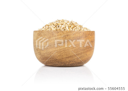 Unpeeled sesame seeds isolated on white 55604555