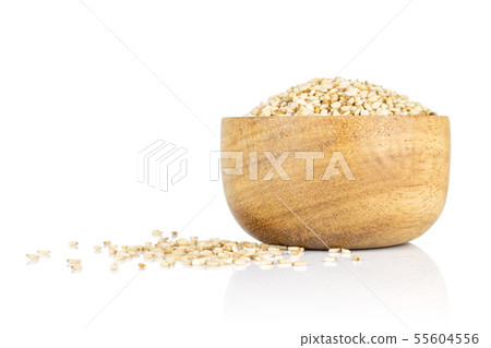 Unpeeled sesame seeds isolated on white Unpeeled sesame seeds isolated on white 55604556