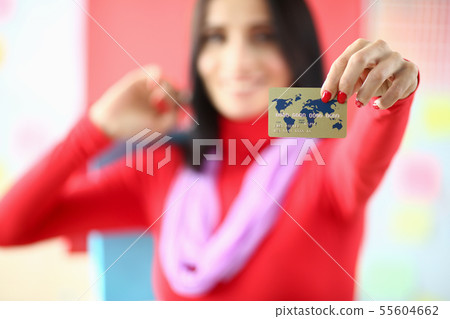 Bauty woman holding plastic credit card 55604662