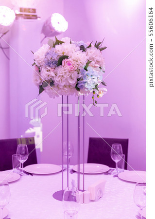 Beautiful table setting with crockery and white 55606164