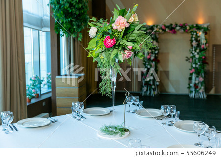 Beautiful table setting with crockery and flower Beautiful table setting with crockery and flower 55606249
