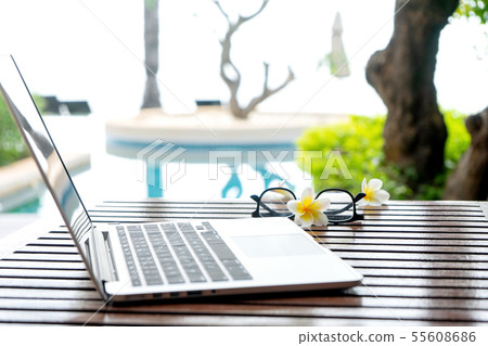 Laptop computer on the wood table 55608686