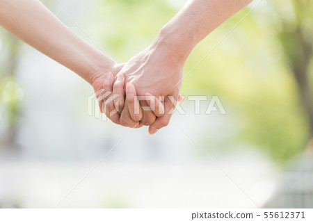 Hand holding body parts 55612371