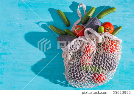 Mesh shopping bag with organic vegetables  55613993