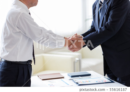 handshake, shaking hand, business man 55616187
