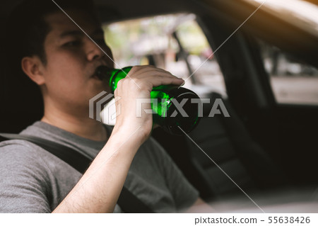 Asian men are breaking the traffic rules by Asian men are breaking the traffic rules by 55638426