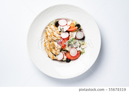grilled chicken with vegetables on the white plate grilled chicken with vegetables on the white plate 55678319