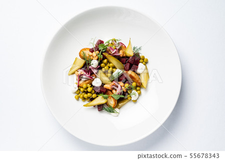 vegetable salad with beetroot on the white plate vegetable salad with beetroot on the white plate 55678343