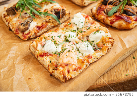 slice of italian pizza in the pizzeria 55678795