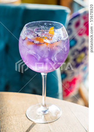 lavender cocktail with orange zest 55678920