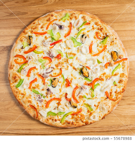 pizza on the wooden background 55678988