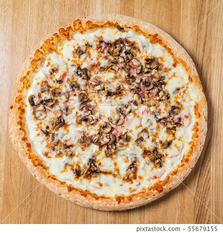 italian pizza on the wooden background 55679155