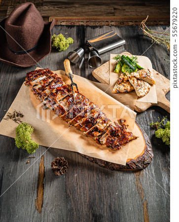 grilled ribs on the wooden board grilled ribs on the wooden board 55679220
