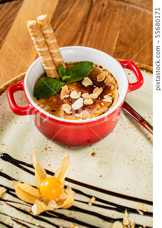 caramel dessert with waffle and physalis caramel dessert with waffle and physalis 55680171