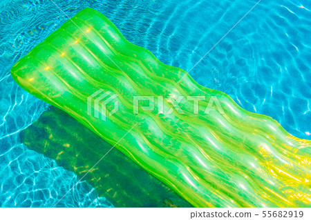Colorful swim ring or rubber float around swimming pool water Colorful swim ring or rubber float around swimming pool water 55682919