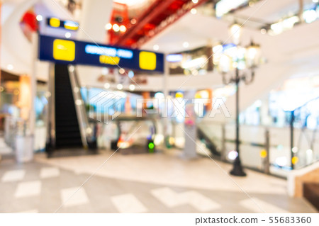 Abstract blur and defocused shopping mall and retail interior of department store Abstract blur and defocused shopping mall and retail interior of department store 55683360