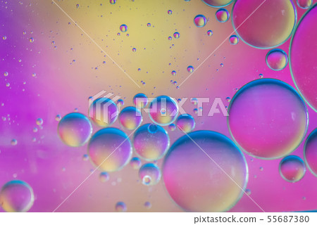 Defocused multicolored abstract background picture made with oil, water and soap Defocused multicolored abstract background picture made with oil, water and soap 55687380