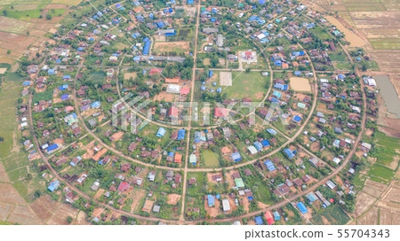 Aerial top view of villages in a circle taken with 55704343