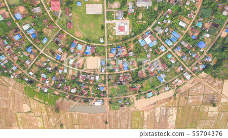 Aerial top view of villages in a circle taken with 55704376