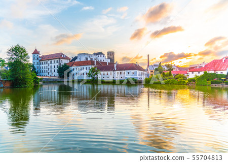 Jindrichuv Hradec Castle at sunset time. Reflected in the Little Vajgar pond, Jindrichuv Hradec Jindrichuv Hradec Castle at sunset time. Reflected in the Little Vajgar pond, Jindrichuv Hradec 55704813
