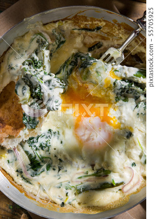 Shakshuka with green onions. Traditional cuisine 55705925