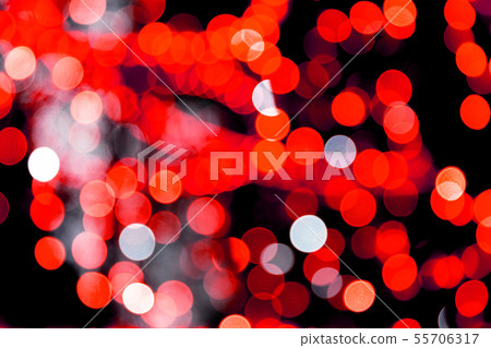 Unfocused abstract red bokeh on black background. Unfocused abstract red bokeh on black background. 55706317