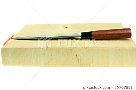 Japanese kitchen deba knife and wood butcher block 55707891