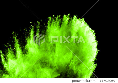 Explosive powder green on black background. 55708069