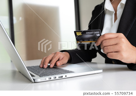 Business woman consumer holding credit card for Business woman consumer holding credit card for 55709734