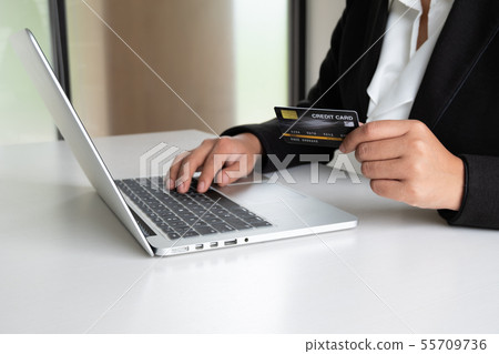 Business woman consumer holding credit card Business woman consumer holding credit card 55709736